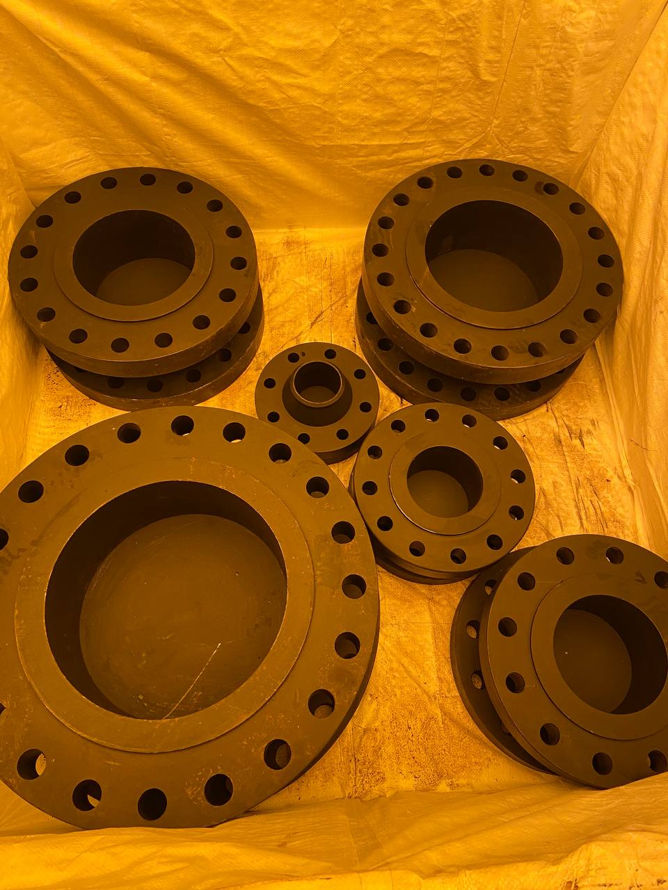 ASTM A105 carbon steel slip-on flanges mixed sizes packed in lined wooden export crate — SORF carbon steel flanges exporter Mumbai India