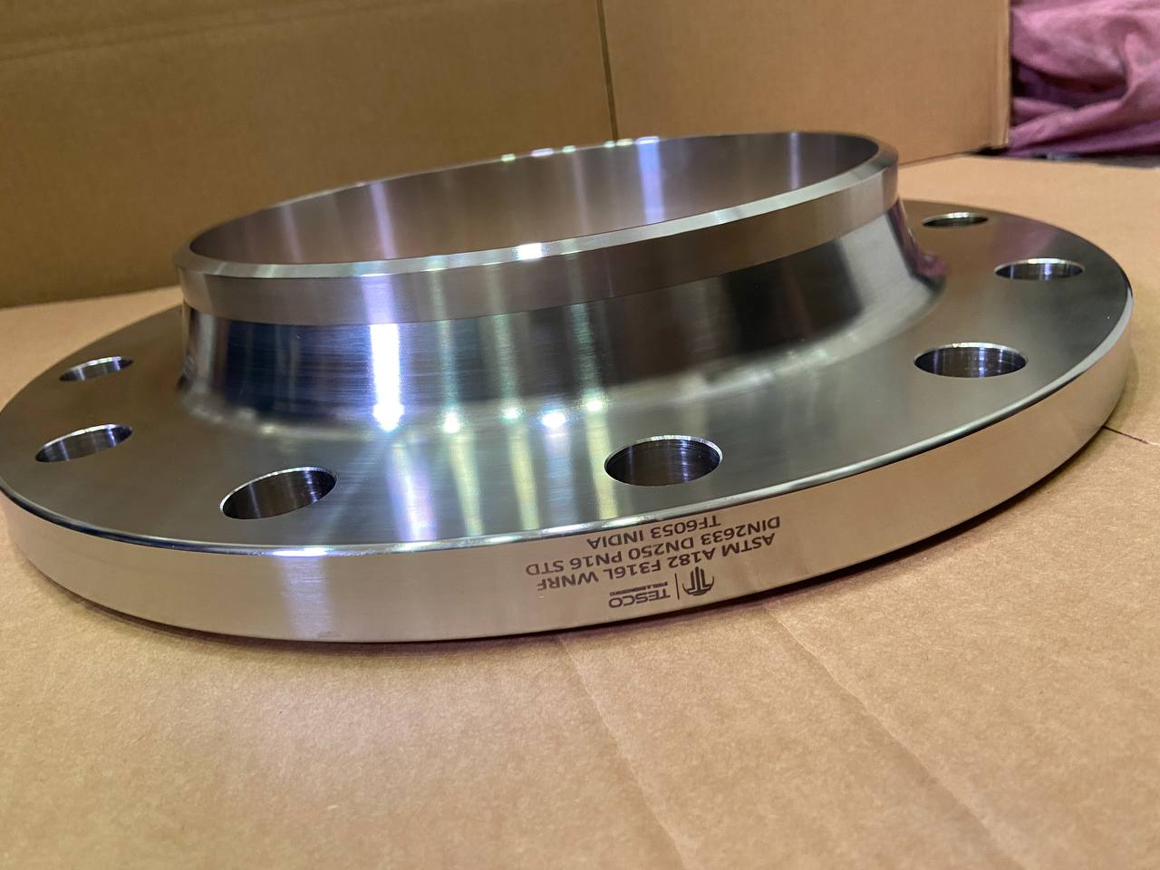 Monel 400 weld neck raised face flange DIN 2633 DN250 PN16 — ASTM B564 UNS N04400, top face view, Tesco Steel & Engineering India