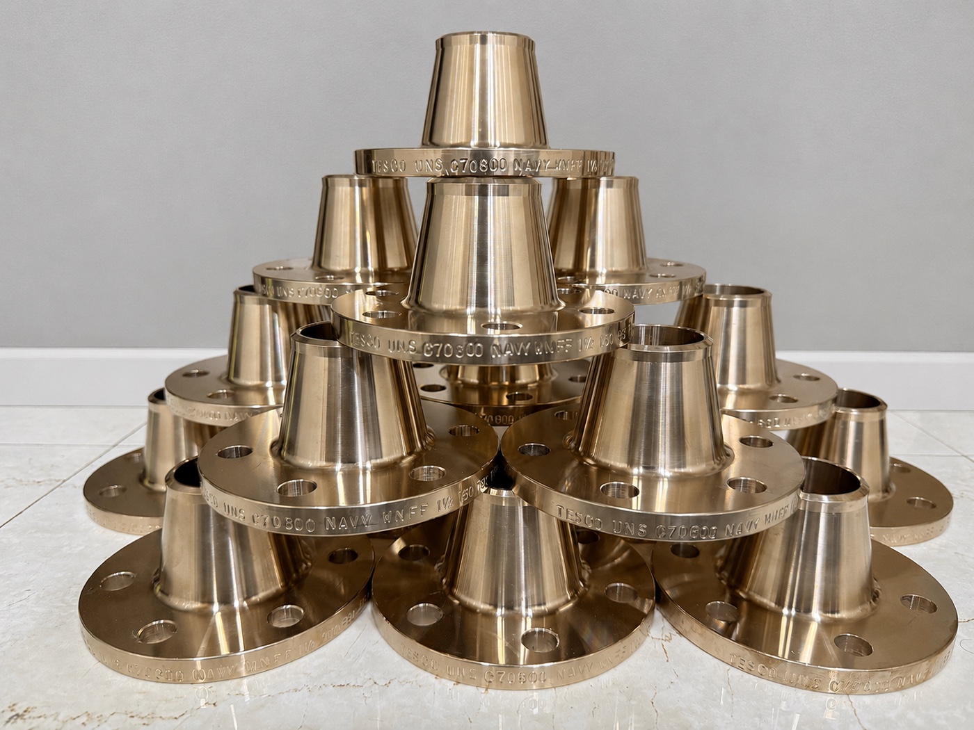 C70600 weld neck flanges — copper nickel 90/10 UNS C70600 flanges with Navy stamping, 1-1/2 inch Class 150, manufactured by Tesco Steel & Engineering