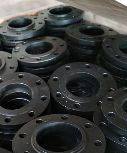 Carbon and alloy steel flanges black coated and crated at our works