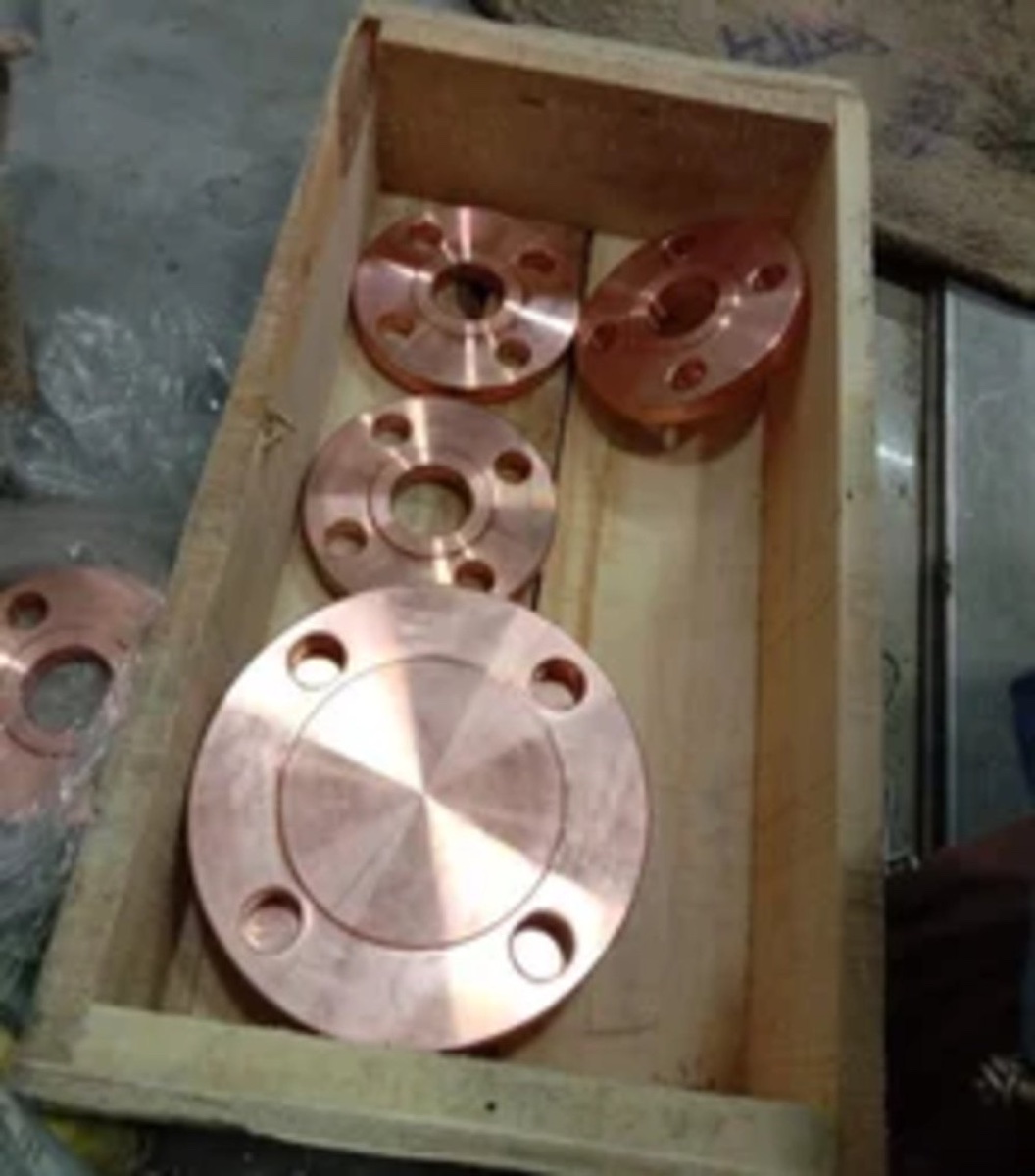 Copper nickel flanges including a blind flange boxed at the Tesco works