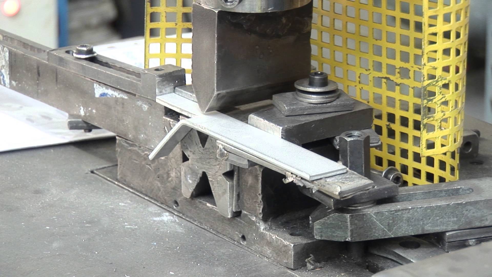 Flat-bar press die forming a Flat Type Y refractory anchor
