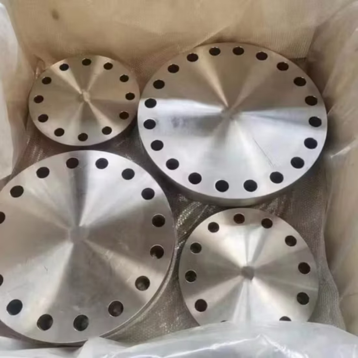 Forged blind flanges machined to ASME B16.5 Class 150 stacked at the works