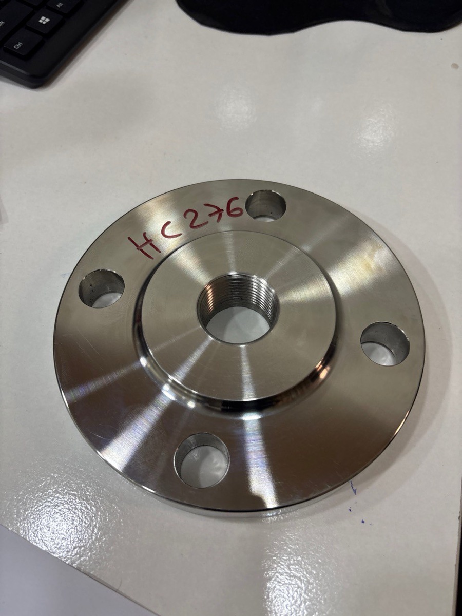 Hastelloy C-276 marked threaded companion flange machined at Tesco Steel & Engineering