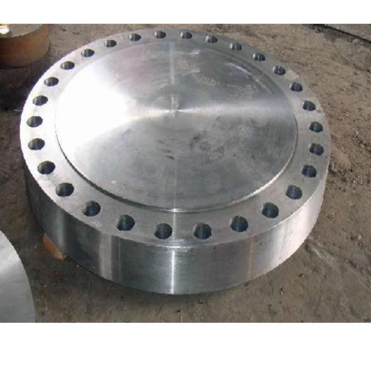 Heavy section forged blind flange with machined raised face at the works