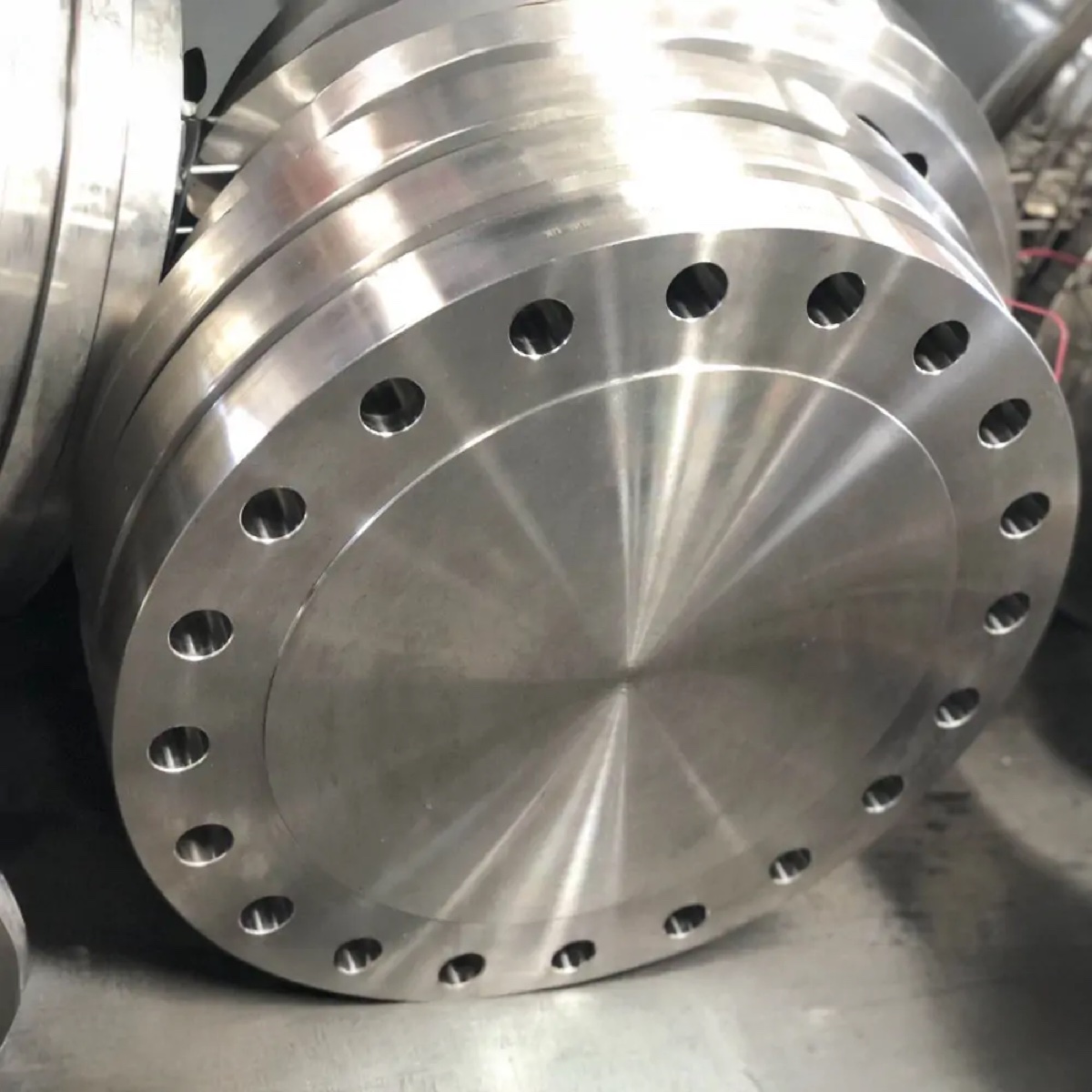 Large machined blind flange with finished gasket face at the flange works