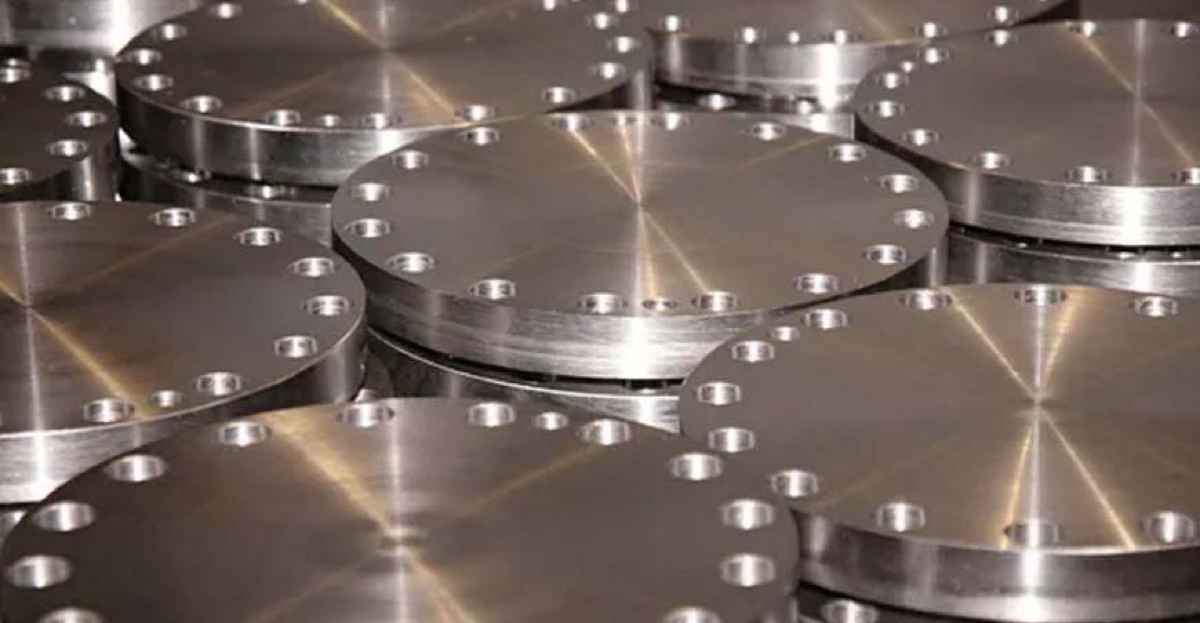 Machined stainless steel blind flanges stacked overlapping at the flange works