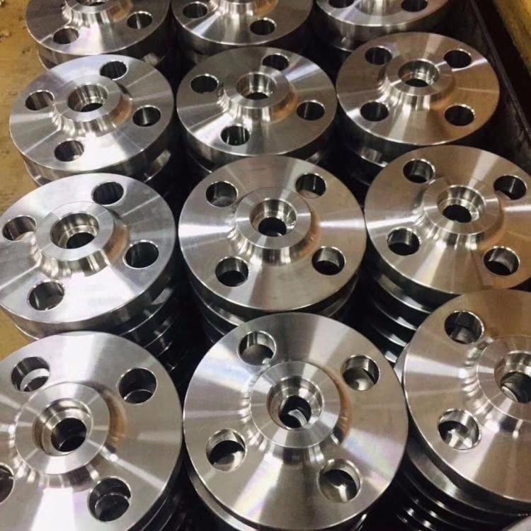 Batch of machined stainless steel socket weld flanges at our works
